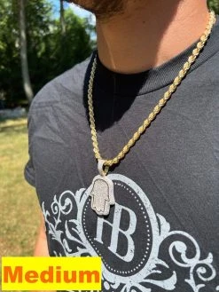 14k Gold Plated 925 Silver Hand Hamsa Iced Baguette CZ Hip Hop Pendant Necklace 22 14k Gold Plated 925 Silver Hand Hamsa Iced Baguette CZ Hip Hop Pendant Necklace -Harlem Bling Shop harlembling 14k gold plated 925 silver hand hamsa iced baguette cz hip hop pendant necklace 11783.1664299960