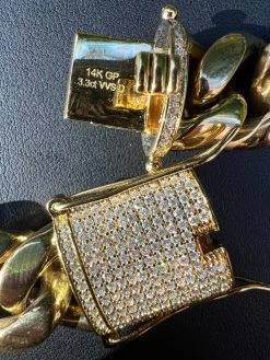 18mm KILO Miami Cuban Chain Bracelet 14k Gold Plated Stainless MOISSANITE Clasp 22 18mm KILO Miami Cuban Chain Bracelet 14k Gold Plated Stainless MOISSANITE Clasp -Harlem Bling Shop harlembling 18mm kilo miami cuban chain bracelet 14k gold plated stainless moissanite clasp 76650.1667572861