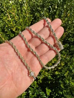Iced MOISSANITE Clasp 14k Gold Plated Stainless Steel Rope Chain Necklace 4-6mm 34 Iced MOISSANITE Clasp 14k Gold Plated Stainless Steel Rope Chain Necklace 4-6mm -Harlem Bling Shop harlembling iced moissanite clasp 14k gold plated stainless steel rope chain necklace 4 6mm 77268.1678388032