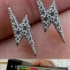 Moissanite Real 925 Silver Iced Hip Hop Lightning Bolt Earrings Passes Tester 2 Moissanite Real 925 Silver Iced Hip Hop Lightning Bolt Earrings Passes Tester -Harlem Bling Shop harlembling moissanite real 925 silver iced hip hop lightning bolt earrings passes tester 97019.1678301928