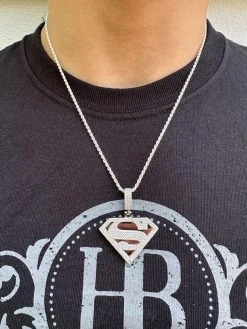MOISSANITE Real 925 Silver/Gold Plated Iced SUPERMAN Logo Out Pendant Necklace -Harlem Bling Shop harlembling moissanite real 925 silvergold plated iced superman logo out pendant necklace 13810.1685655647