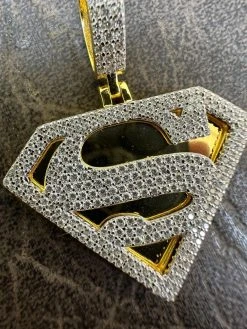 MOISSANITE Real 925 Silver/Gold Plated Iced SUPERMAN Logo Out Pendant Necklace -Harlem Bling Shop harlembling moissanite real 925 silvergold plated iced superman logo out pendant necklace 83337.1685655723