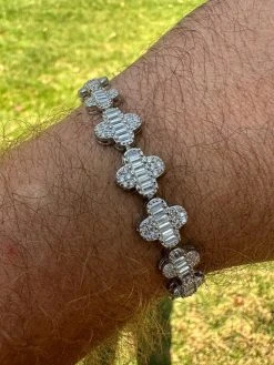 Real MOISSANITE 925 Silver 12mm Iced Baguette Clover Graduated Tennis Bracelet 27 Real MOISSANITE 925 Silver 12mm Iced Baguette Clover Graduated Tennis Bracelet -Harlem Bling Shop harlembling real moissanite 925 silver 12mm iced baguette clover graduated tennis bracelet 67797.1697597222