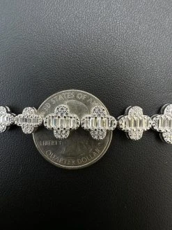 Real MOISSANITE 925 Silver 12mm Iced Baguette Clover Graduated Tennis Bracelet 30 Real MOISSANITE 925 Silver 12mm Iced Baguette Clover Graduated Tennis Bracelet -Harlem Bling Shop harlembling real moissanite 925 silver 12mm iced baguette clover graduated tennis bracelet 93474.1697597168