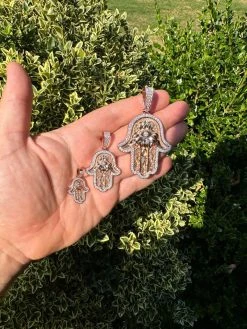 Real Rose Gold & 925 Sterling Silver Hamsa Evil Eye Hand Iced MOISSANITE Pendant 41 Real Rose Gold & 925 Sterling Silver Hamsa Evil Eye Hand Iced MOISSANITE Pendant -Harlem Bling Shop harlembling real rose gold and 925 sterling silver hamsa evil eye hand iced moissanite pendant 35816.1694222495