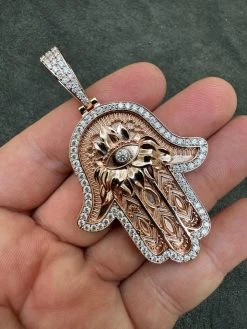 Real Rose Gold & 925 Sterling Silver Hamsa Evil Eye Hand Iced MOISSANITE Pendant 24 Real Rose Gold & 925 Sterling Silver Hamsa Evil Eye Hand Iced MOISSANITE Pendant -Harlem Bling Shop harlembling real rose gold and 925 sterling silver hamsa evil eye hand iced moissanite pendant 48212.1694222340