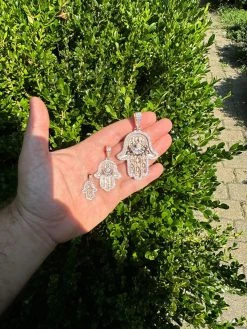 Real Rose Gold & 925 Sterling Silver Hamsa Evil Eye Hand Iced MOISSANITE Pendant 40 Real Rose Gold & 925 Sterling Silver Hamsa Evil Eye Hand Iced MOISSANITE Pendant -Harlem Bling Shop harlembling real rose gold and 925 sterling silver hamsa evil eye hand iced moissanite pendant 63809.1694222468