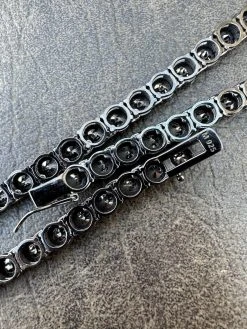 Real Black MOISSANITE 7mm Tennis Chain Black Rhodium 925 Silver Iced Necklace 34 Real Black MOISSANITE 7mm Tennis Chain Black Rhodium 925 Silver Iced Necklace -Harlem Bling Shop italiano silver inc real black moissanite 7mm tennis chain black rhodium 925 silver iced necklace 74517.1676658116