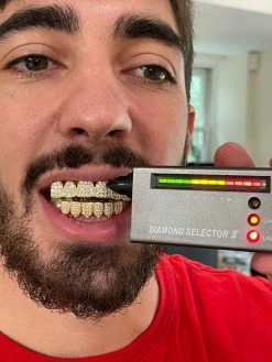 MOISSANITE GRILLZ Pass Diamond Test Teeth Top & Bottom Hip Hop 14k Gold Vermeil 25 MOISSANITE GRILLZ Pass Diamond Test Teeth Top & Bottom Hip Hop 14k Gold Vermeil -Harlem Bling Shop moissanite grillz pass diamond test teeth top and bottom hip hop 14k gold vermeil 97079.1664372750